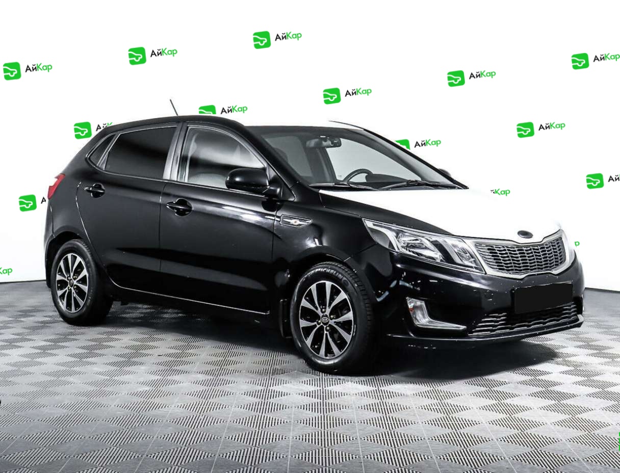 Kia Rio с пробегом — 2013 год. Фото: #2