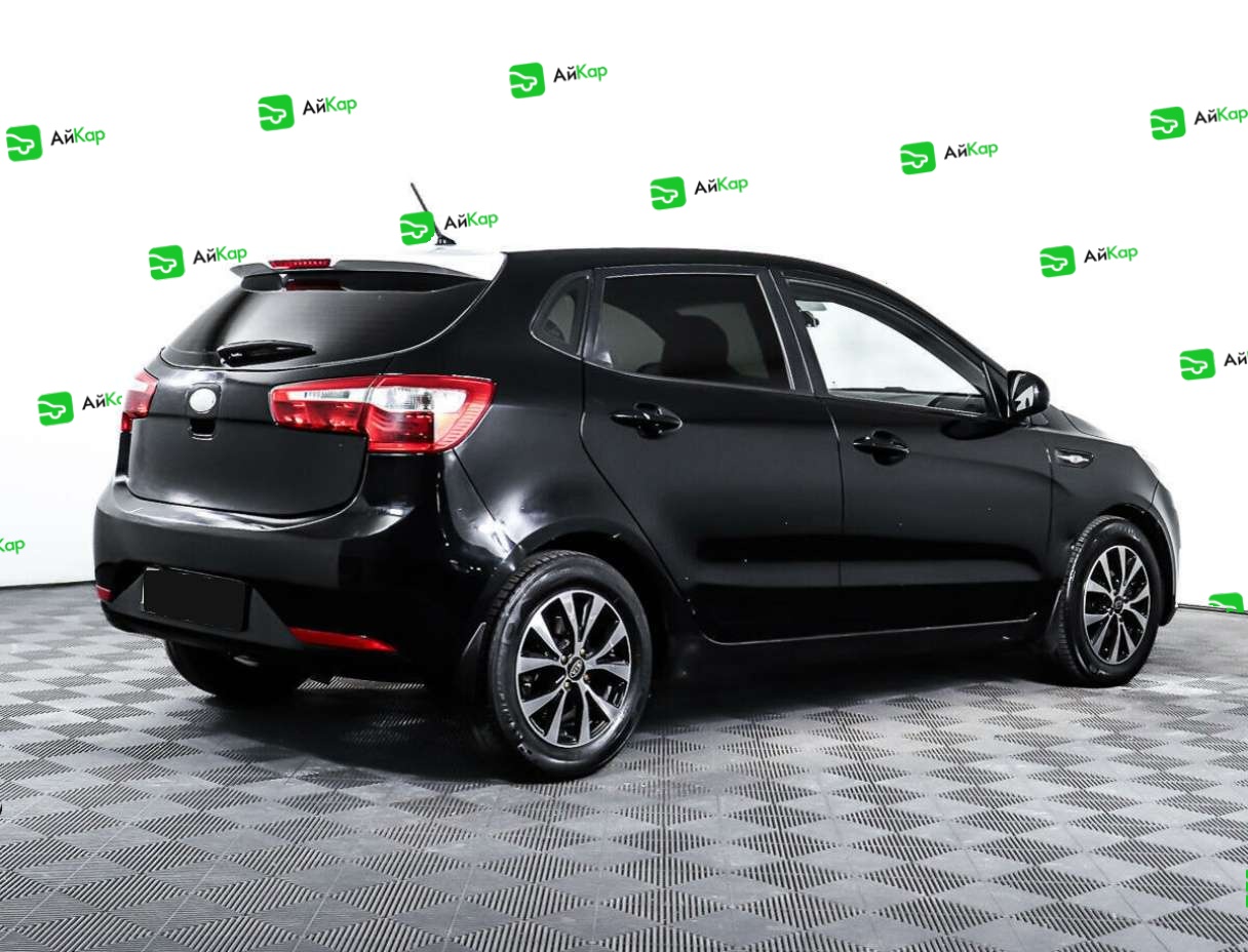 Kia Rio с пробегом — 2013 год. Фото: #4