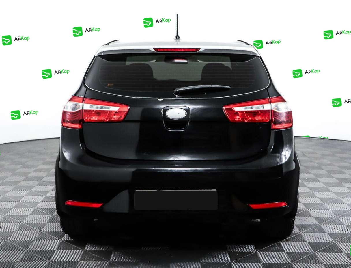 Kia Rio с пробегом — 2013 год. Фото: #5