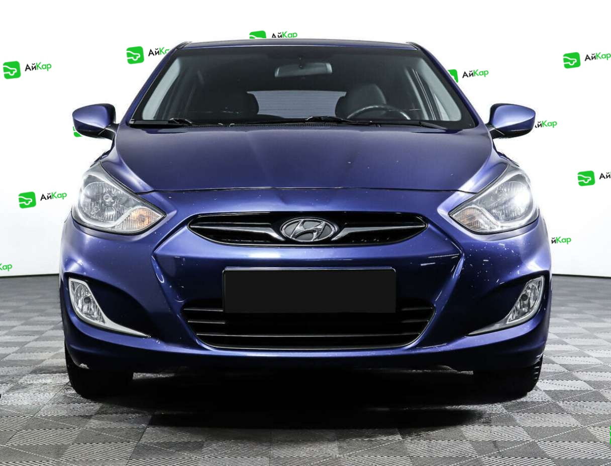 Hyundai Solaris с пробегом — 2012 год. Фото: #1