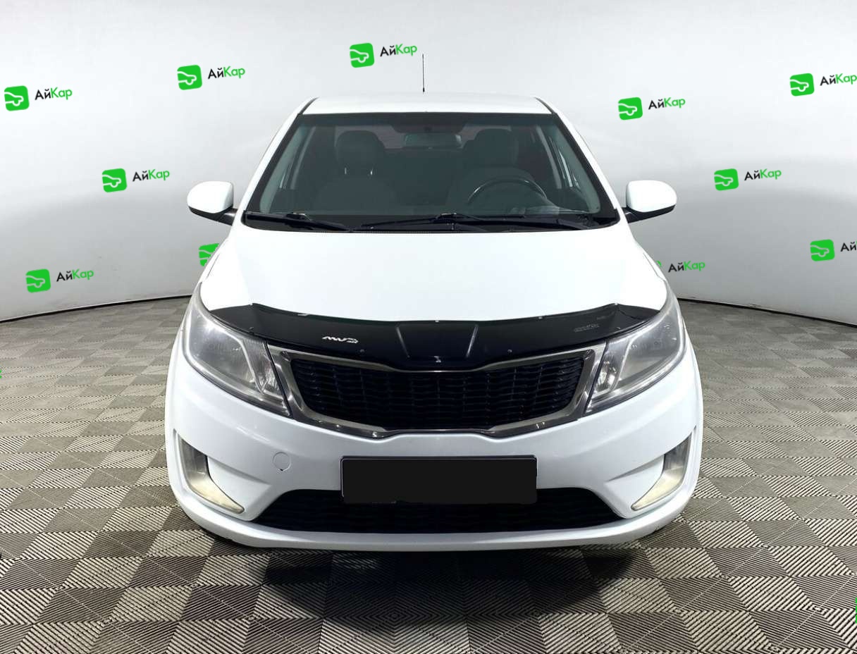 Kia Rio с пробегом — 2014 год. Фото: #1