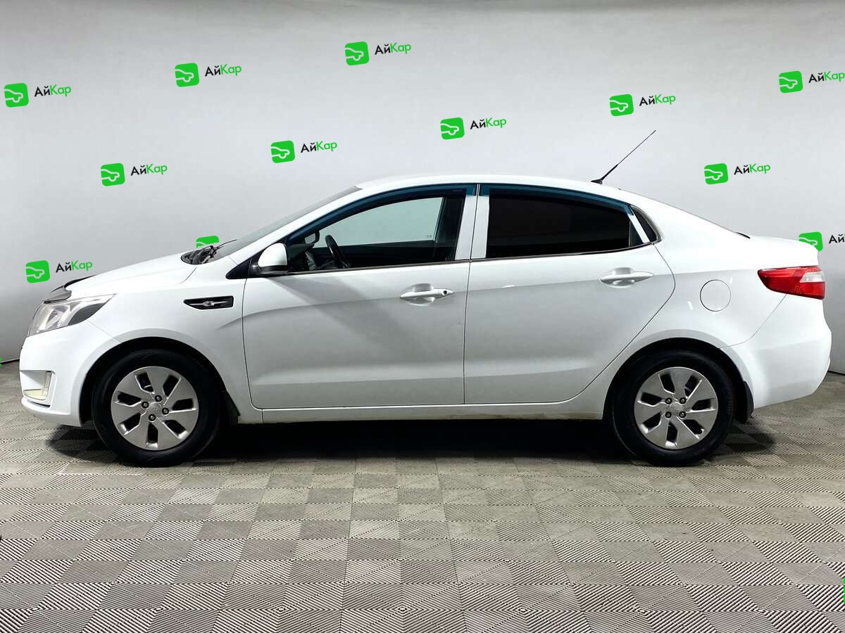 Kia Rio с пробегом — 2014 год. Фото: #7