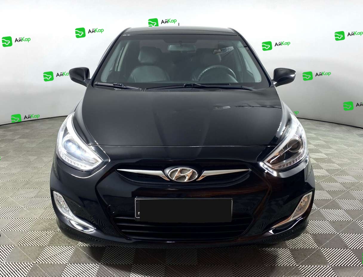 Hyundai Solaris с пробегом — 2013 год. Фото: #1