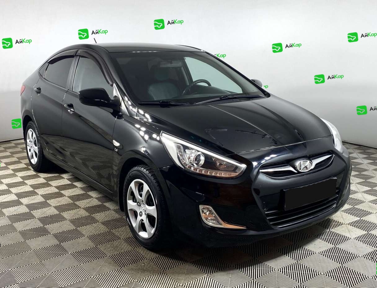 Hyundai Solaris с пробегом — 2013 год. Фото: #2
