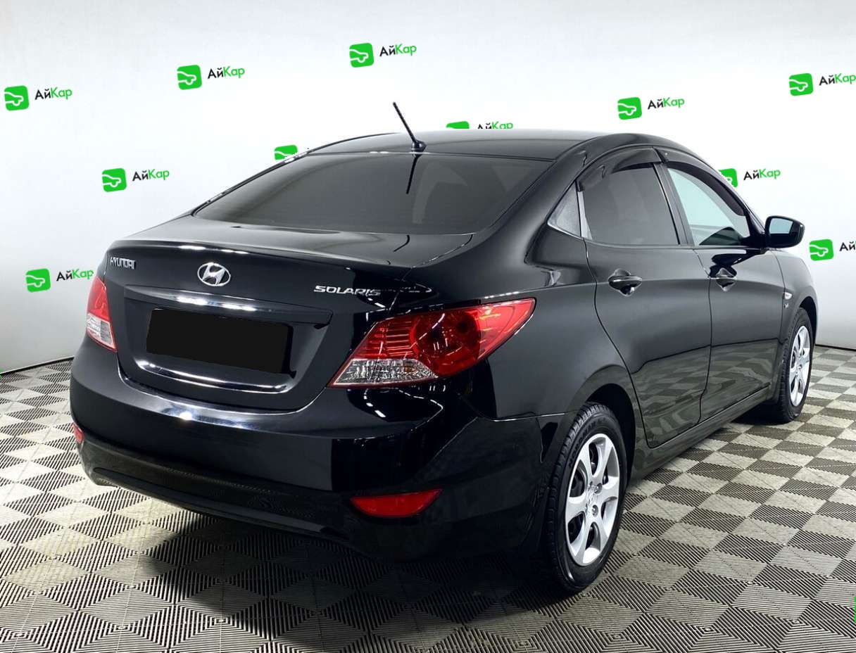 Hyundai Solaris с пробегом — 2013 год. Фото: #4