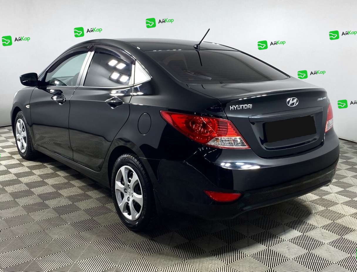 Hyundai Solaris с пробегом — 2013 год. Фото: #6