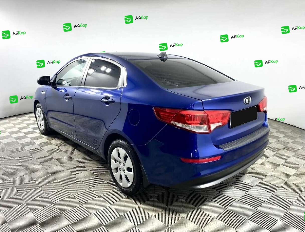 Kia Rio с пробегом — 2015 год. Фото: #6