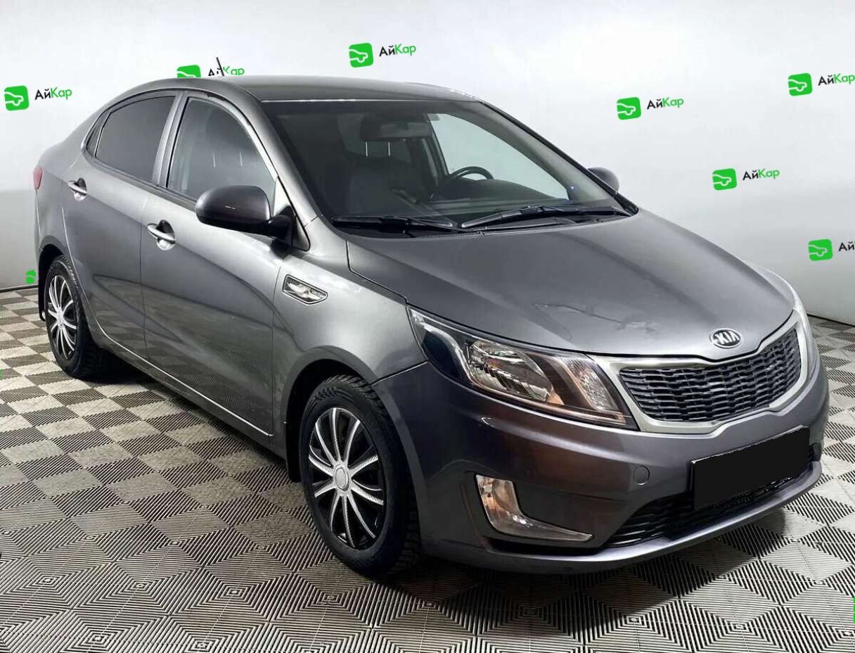 Kia Rio с пробегом — 2013 год. Фото: #2