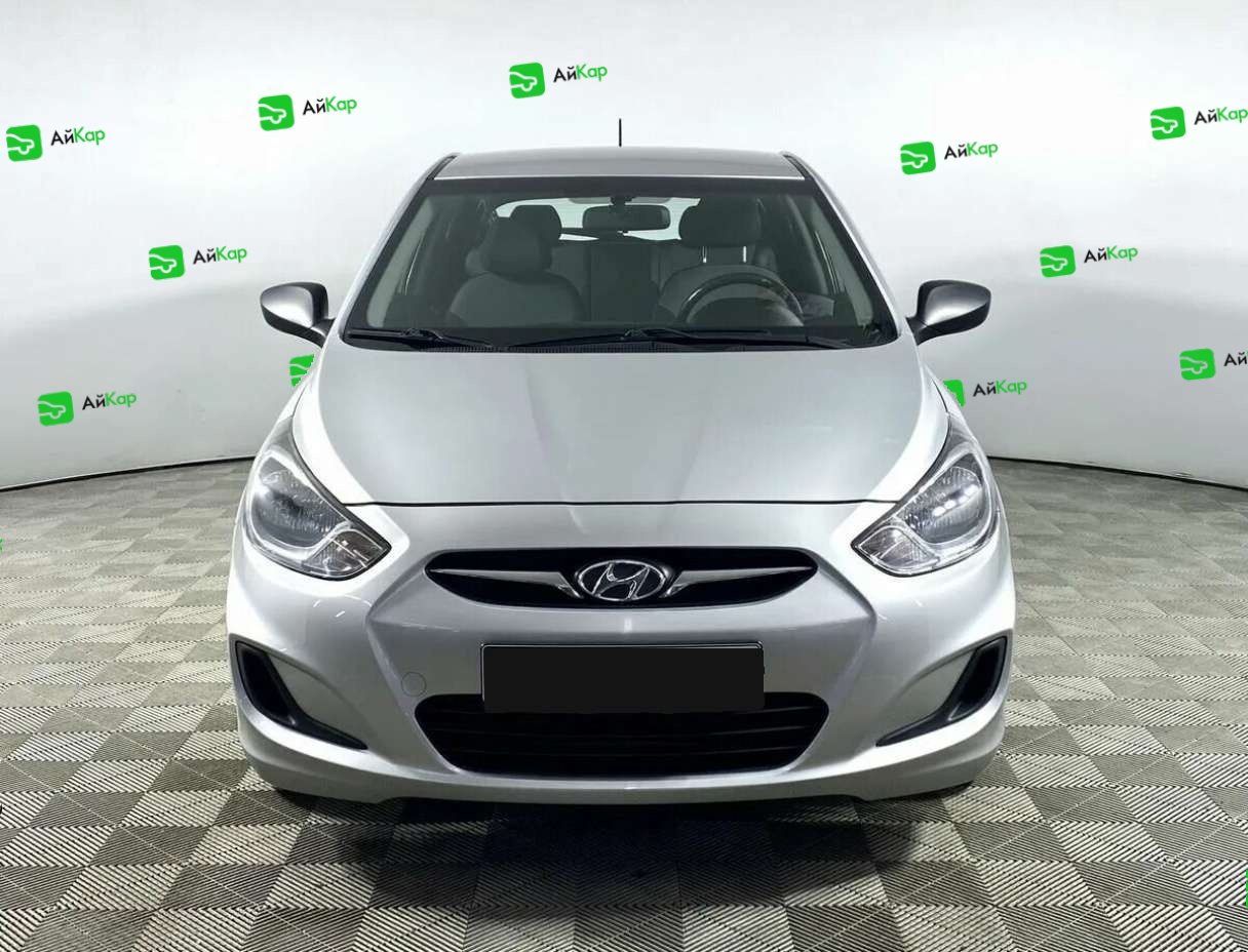 Hyundai Solaris с пробегом — 2014 год. Фото: #1