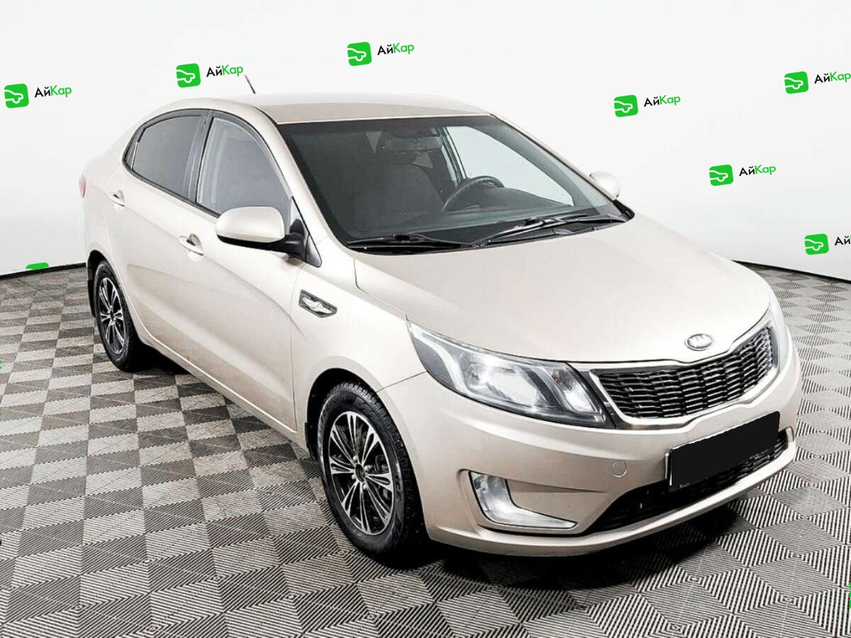 Kia Rio с пробегом — 2013 год. Фото: #2