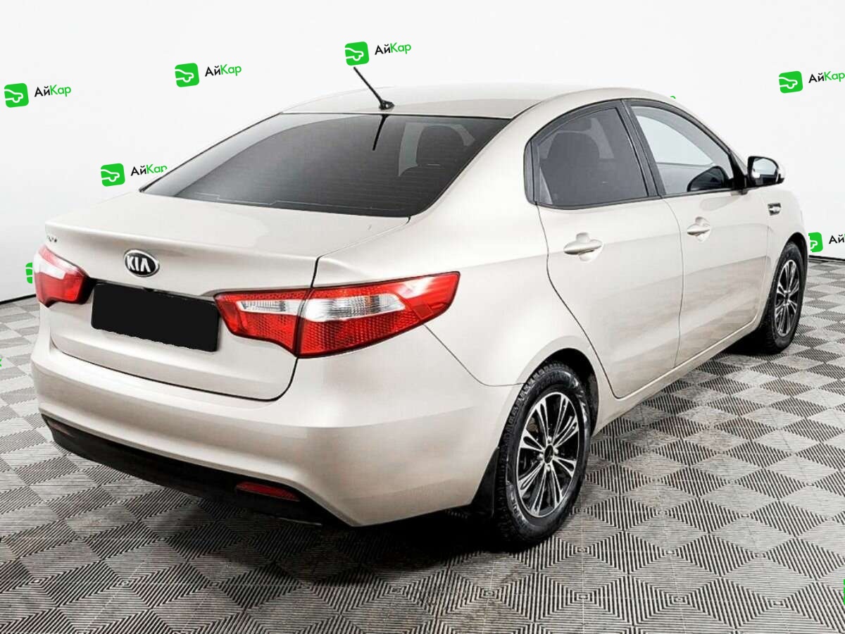 Kia Rio с пробегом — 2013 год. Фото: #4