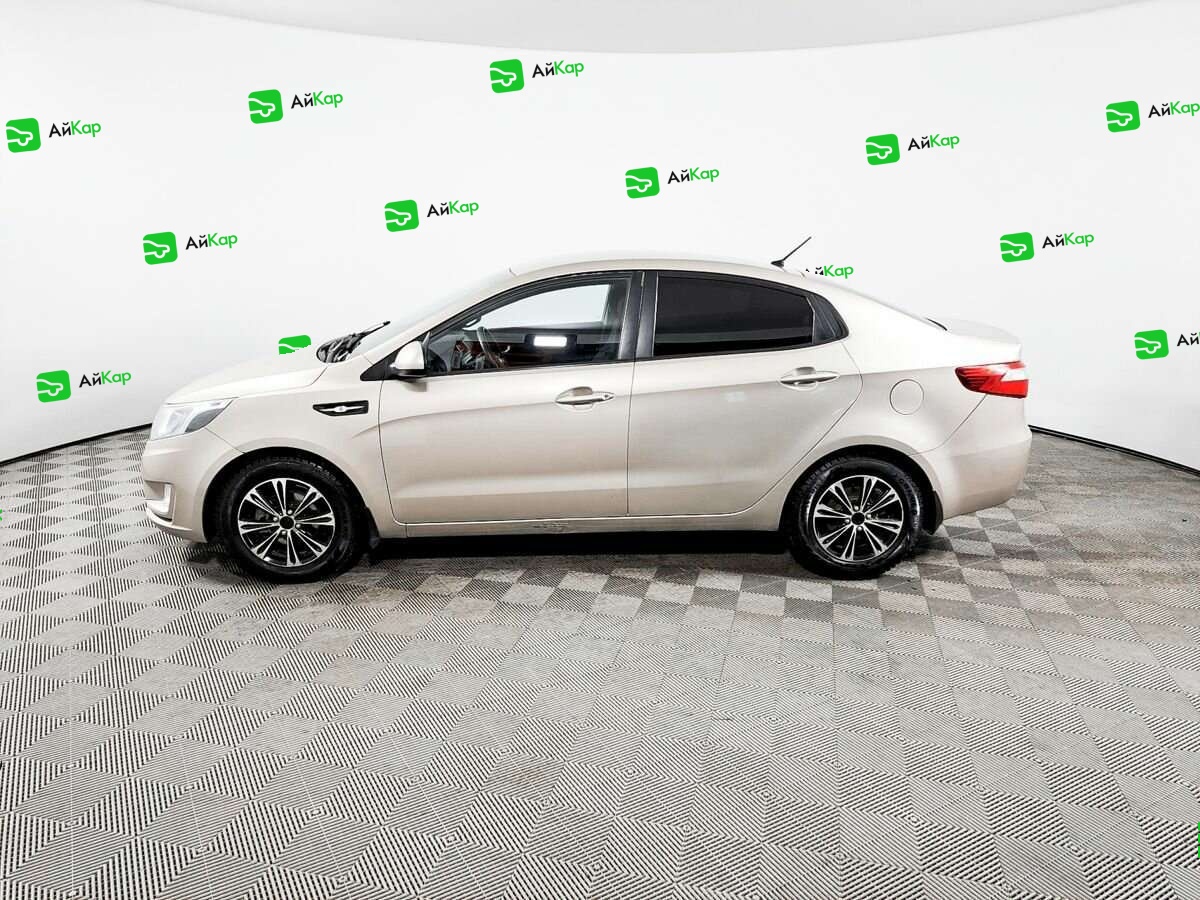 Kia Rio с пробегом — 2013 год. Фото: #7