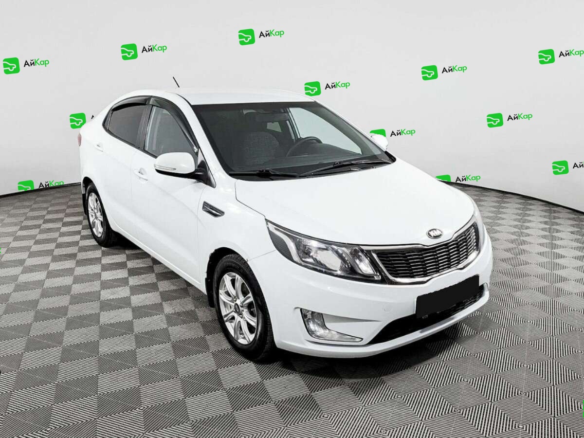 Kia Rio с пробегом — 2013 год. Фото: #2