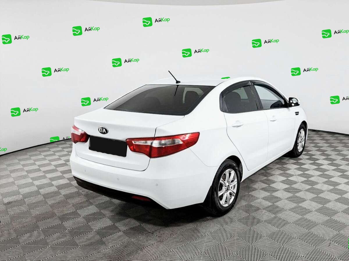 Kia Rio с пробегом — 2013 год. Фото: #4