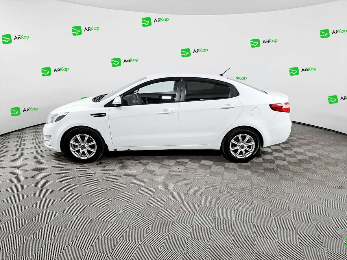 Kia Rio с пробегом — 2013 год. Фото: #7
