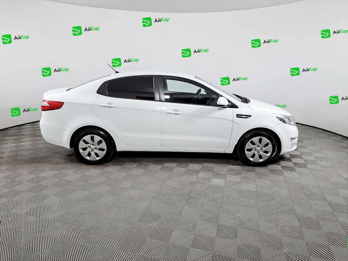 Kia Rio с пробегом — 2013 год. Фото: #3