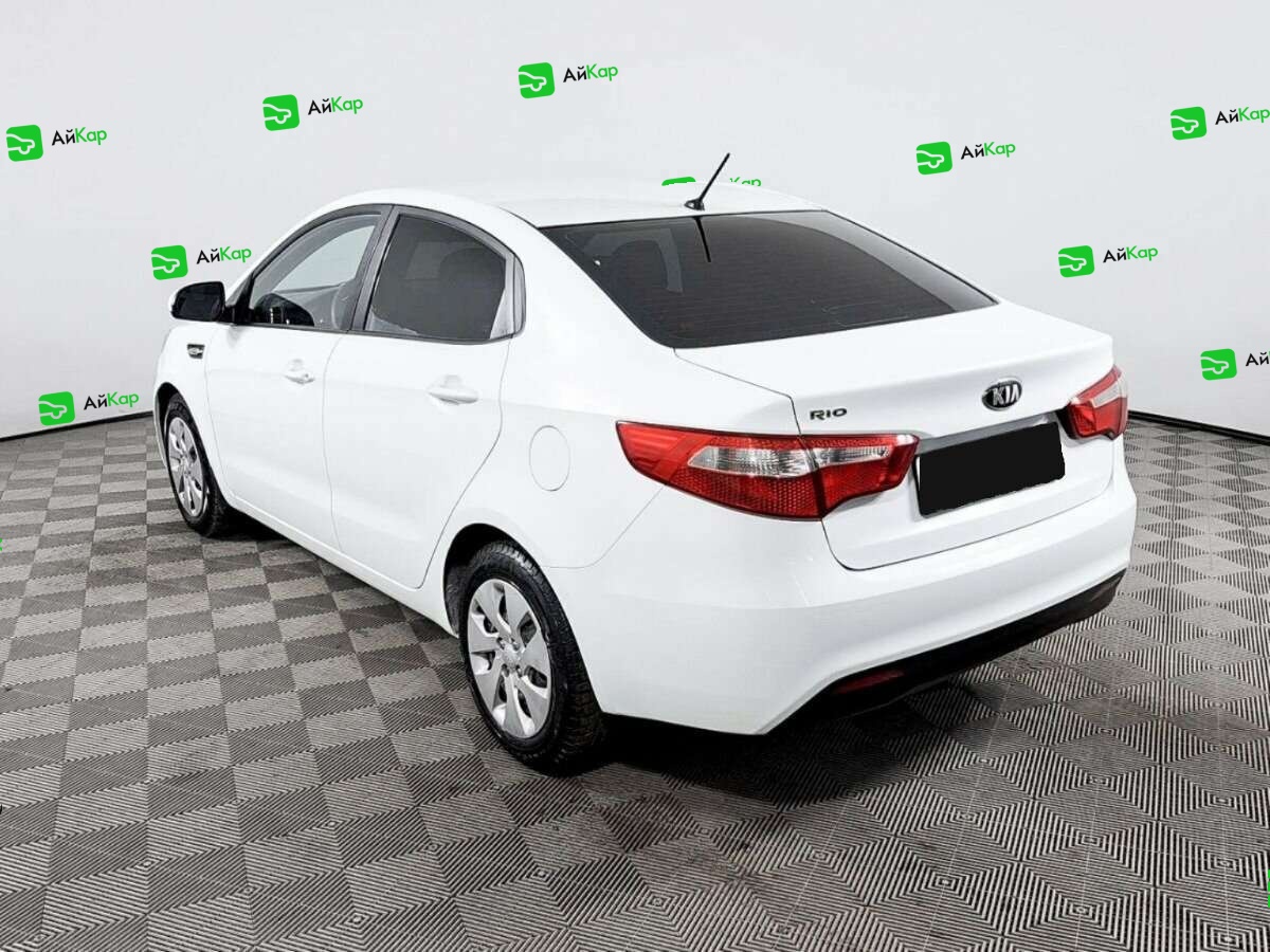 Kia Rio с пробегом — 2013 год. Фото: #6