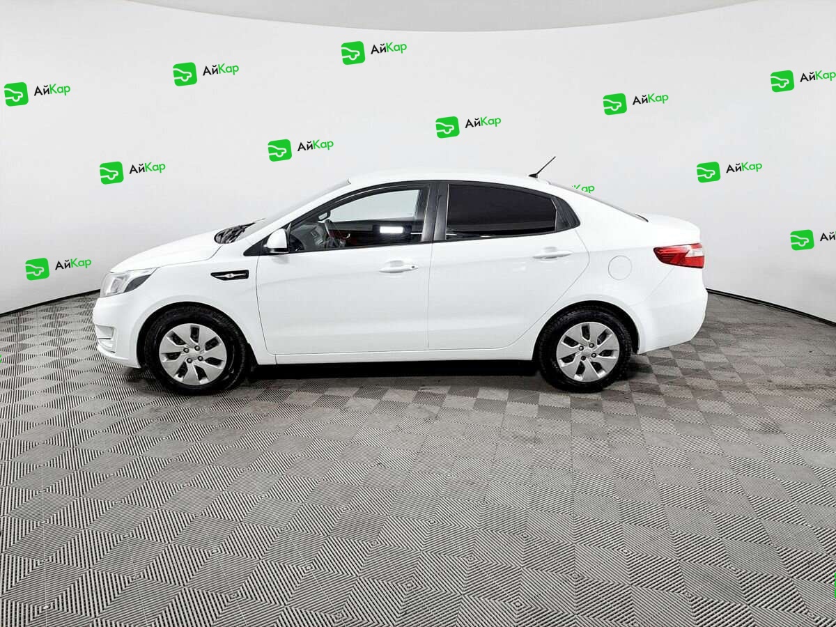 Kia Rio с пробегом — 2013 год. Фото: #7