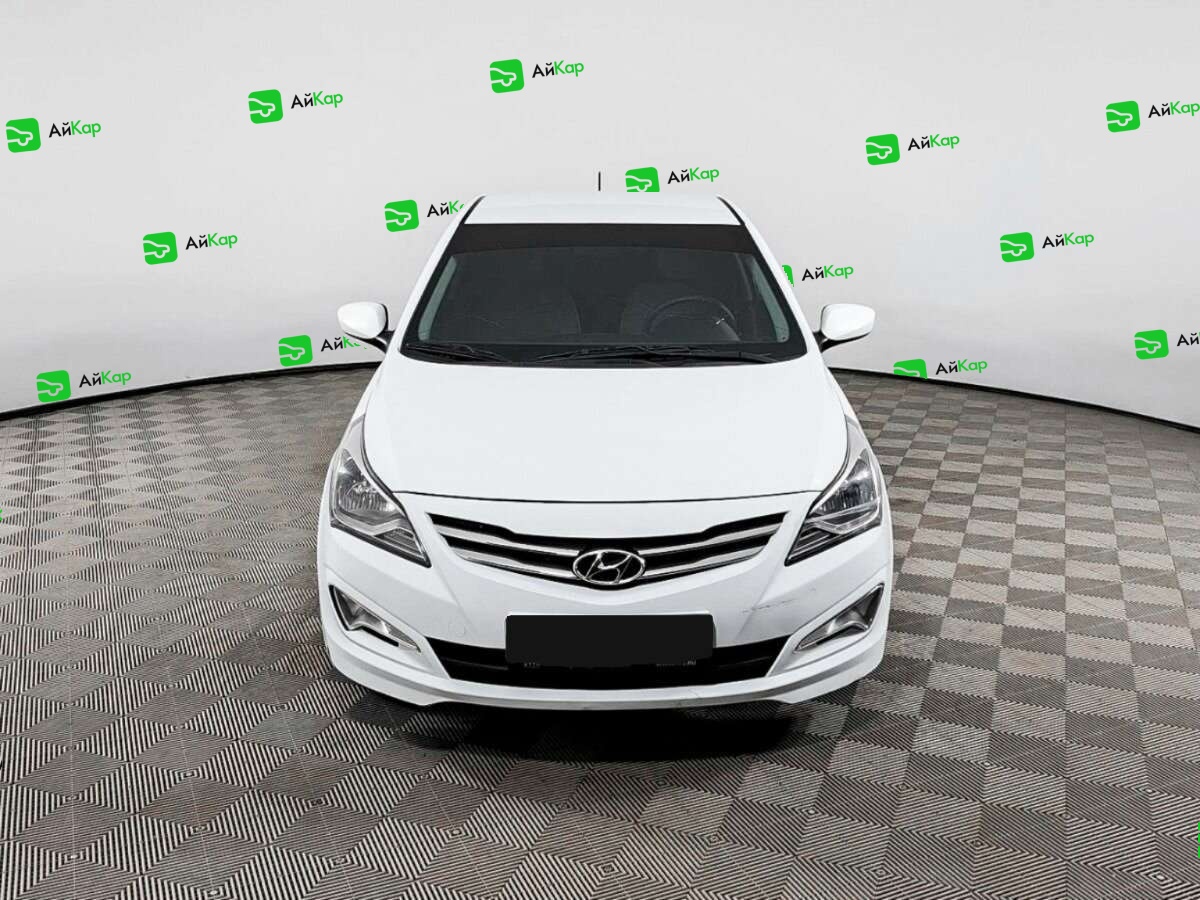 Hyundai Solaris с пробегом — 2016 год. Фото: #1