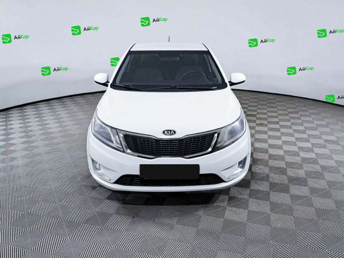 Kia Rio с пробегом — 2012 год. Фото: #1