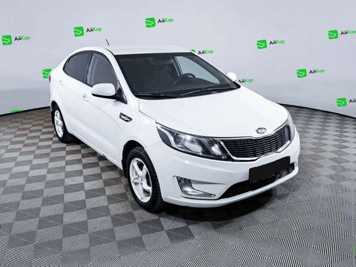 Kia Rio с пробегом — 2012 год. Фото: #2