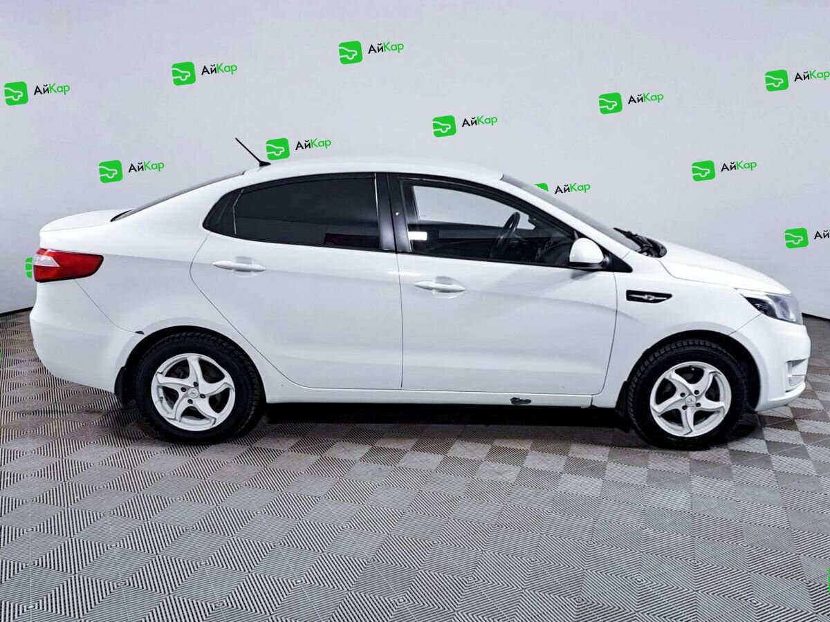 Kia Rio с пробегом — 2012 год. Фото: #3