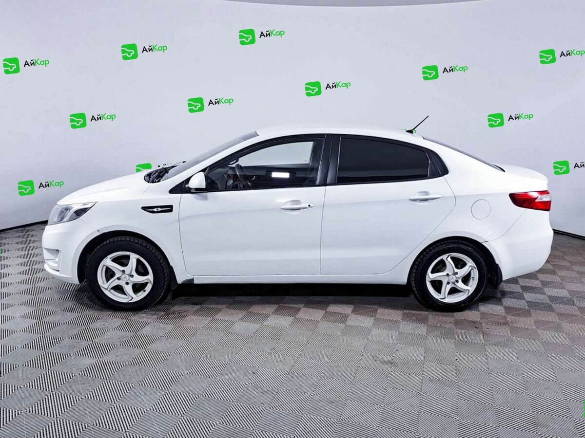 Kia Rio с пробегом — 2012 год. Фото: #7