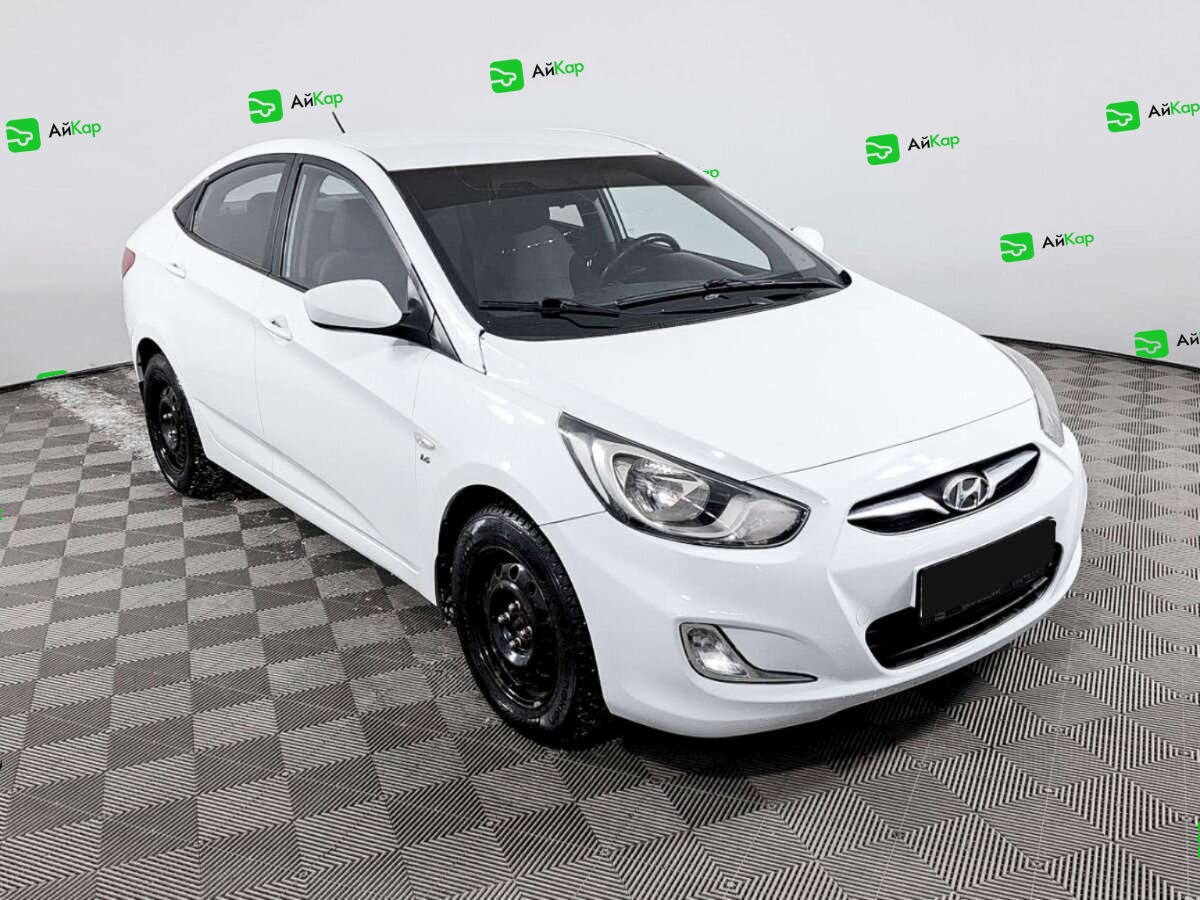 Hyundai Solaris с пробегом — 2013 год. Фото: #2
