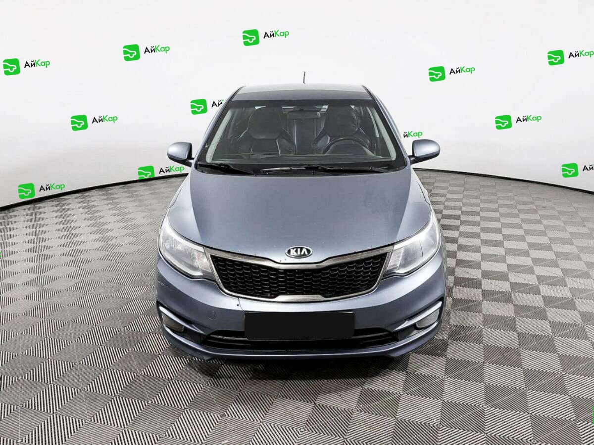 Kia Rio с пробегом — 2015 год. Фото: #1