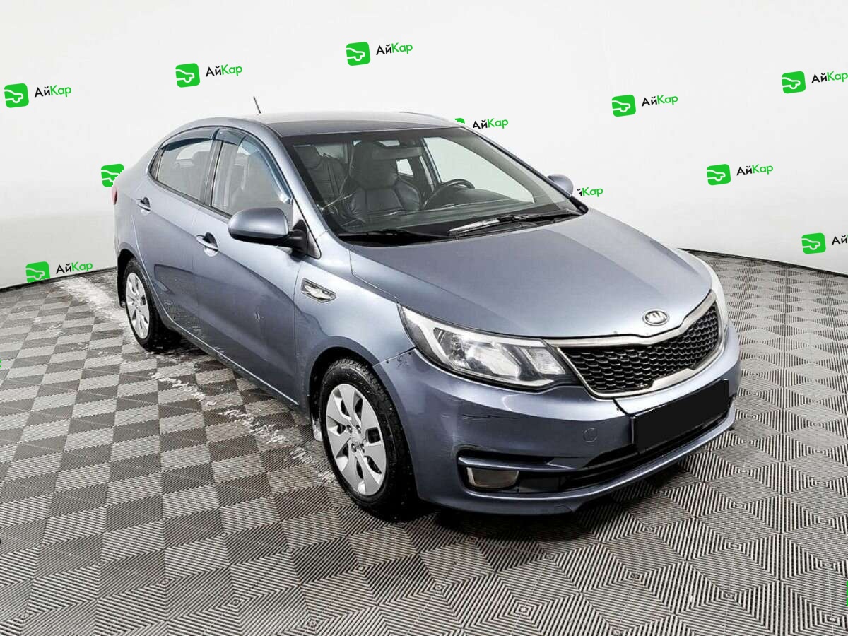 Kia Rio с пробегом — 2015 год. Фото: #2