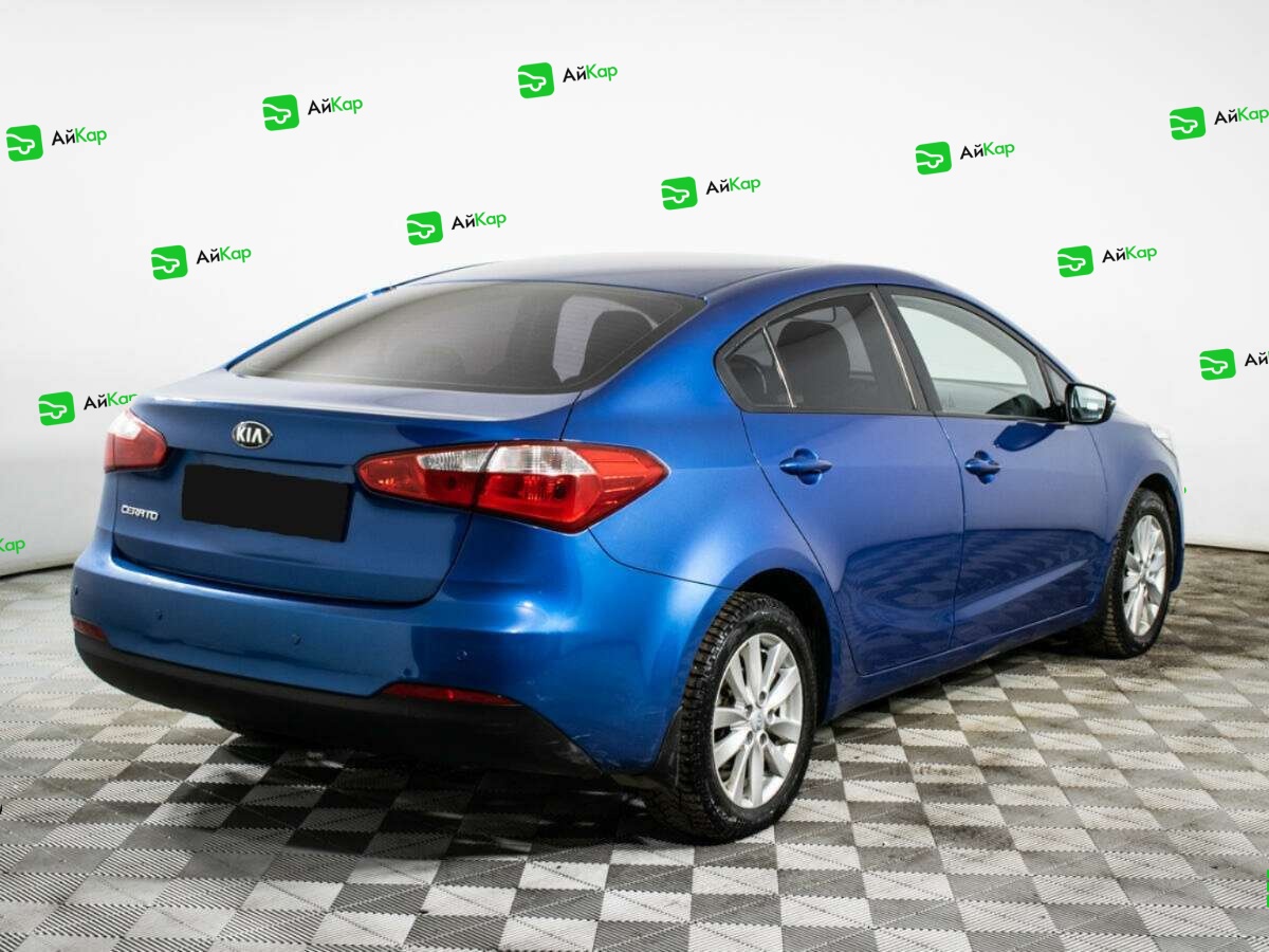 Kia Cerato с пробегом — 2014 год. Фото: #4