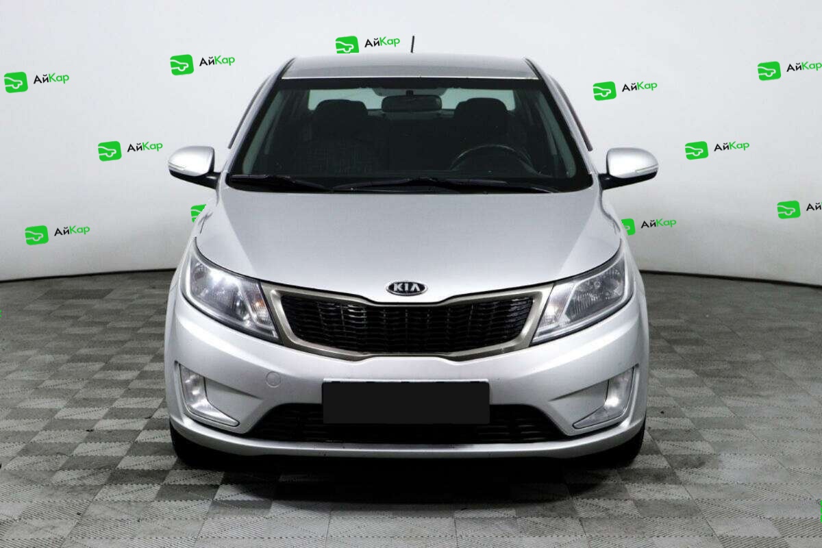 Kia Rio с пробегом — 2012 год. Фото: #1