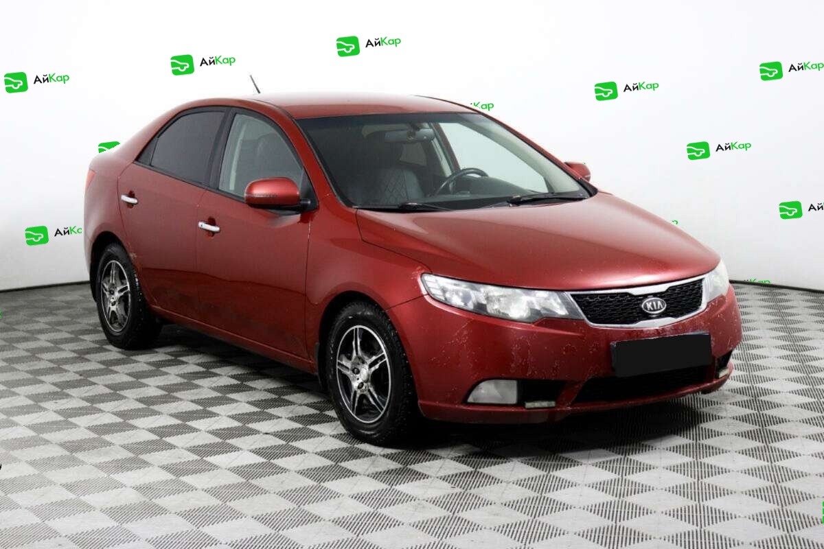Kia Cerato с пробегом — 2012 год. Фото: #2