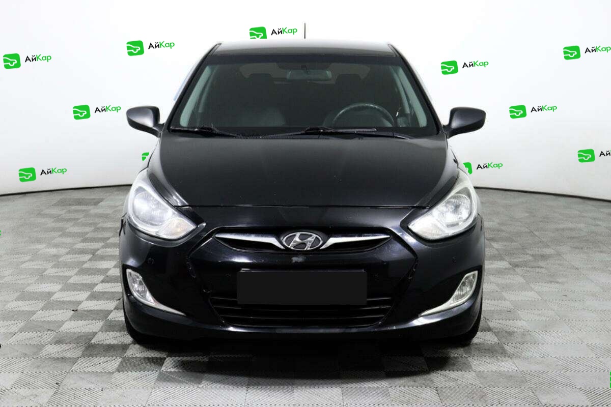 Hyundai Solaris с пробегом — 2012 год. Фото: #1