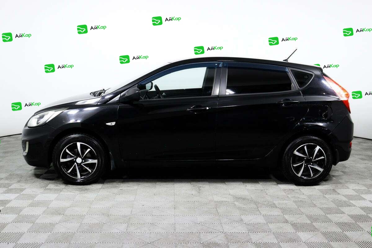 Hyundai Solaris с пробегом — 2012 год. Фото: #7