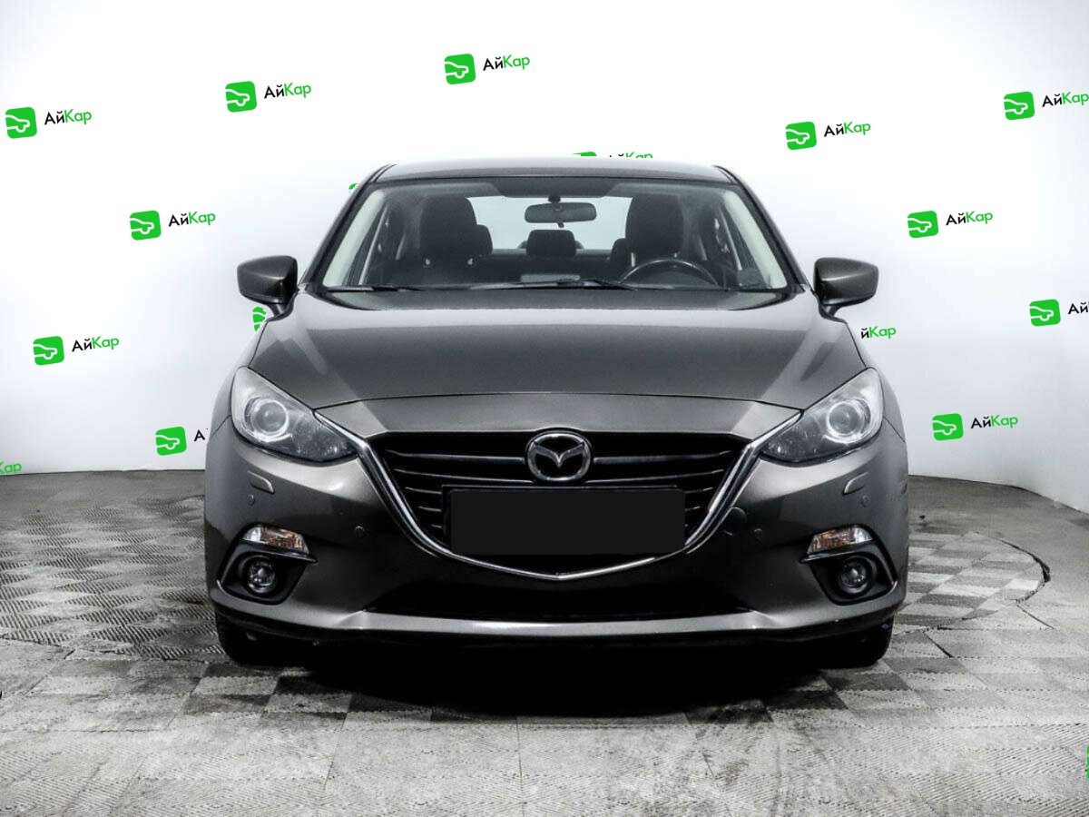 Mazda 3 с пробегом — 2014 год. Фото: #1