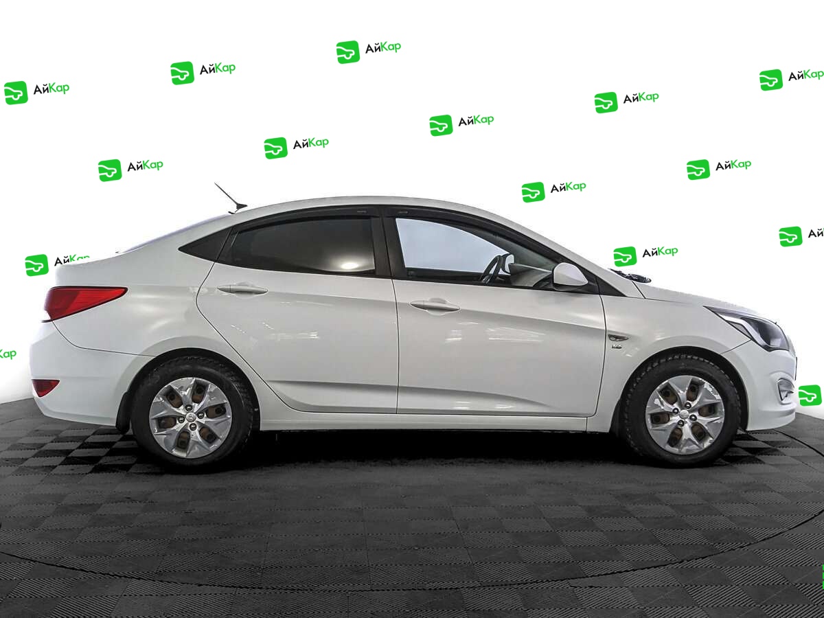 Hyundai Solaris с пробегом — 2015 год. Фото: #2