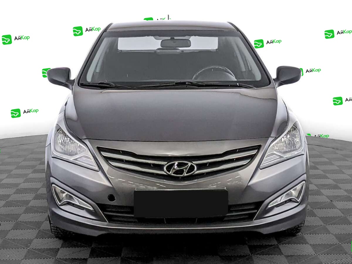 Hyundai Solaris с пробегом — 2014 год. Фото: #1