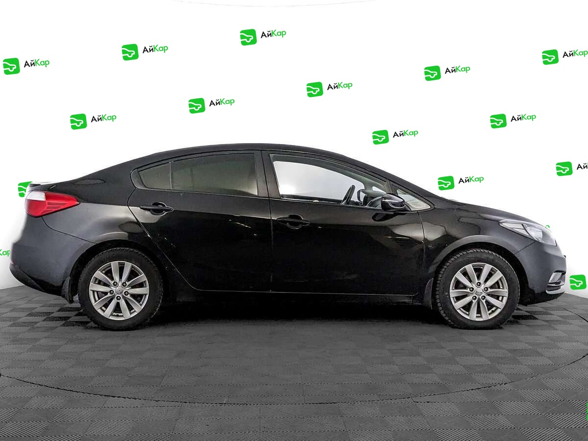 Kia Cerato с пробегом — 2015 год. Фото: #3