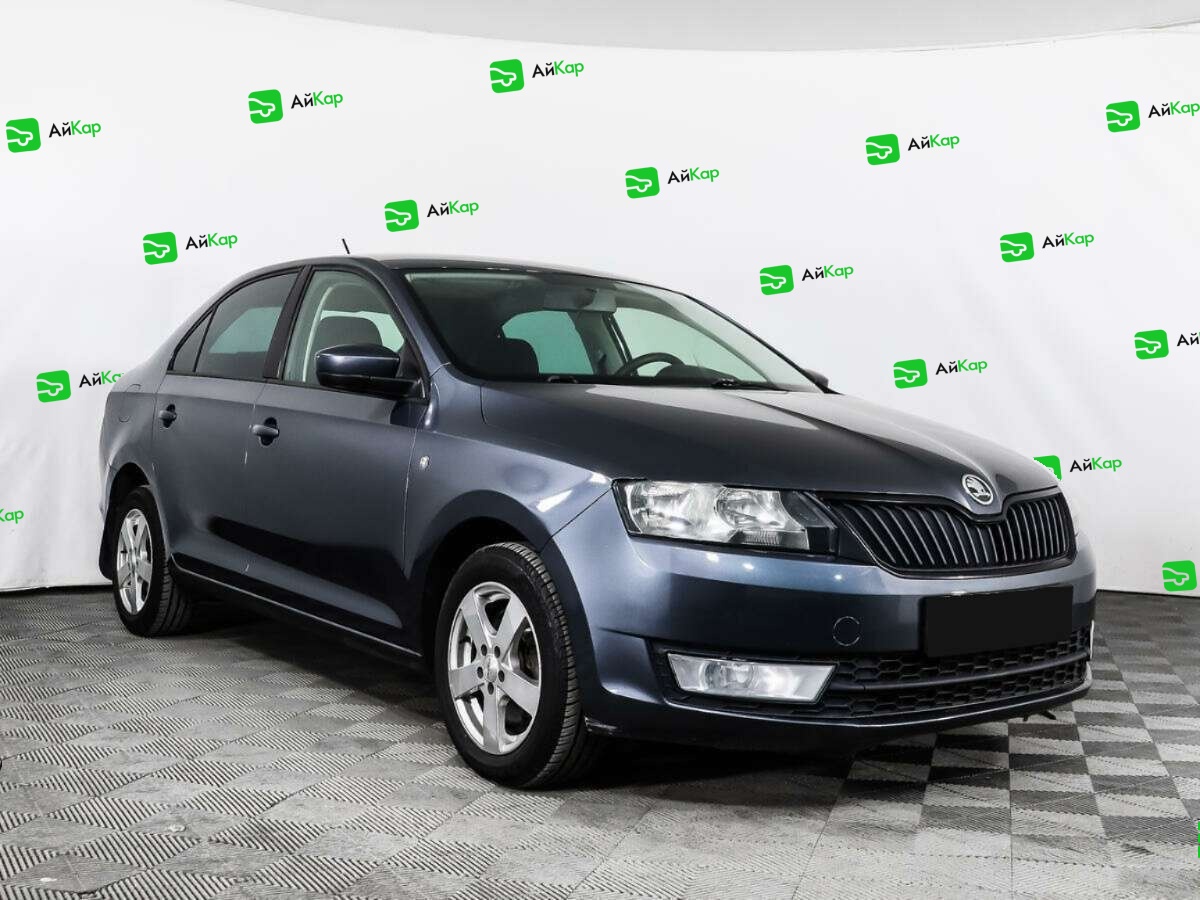 Skoda Rapid с пробегом — 2014 год. Фото: #2