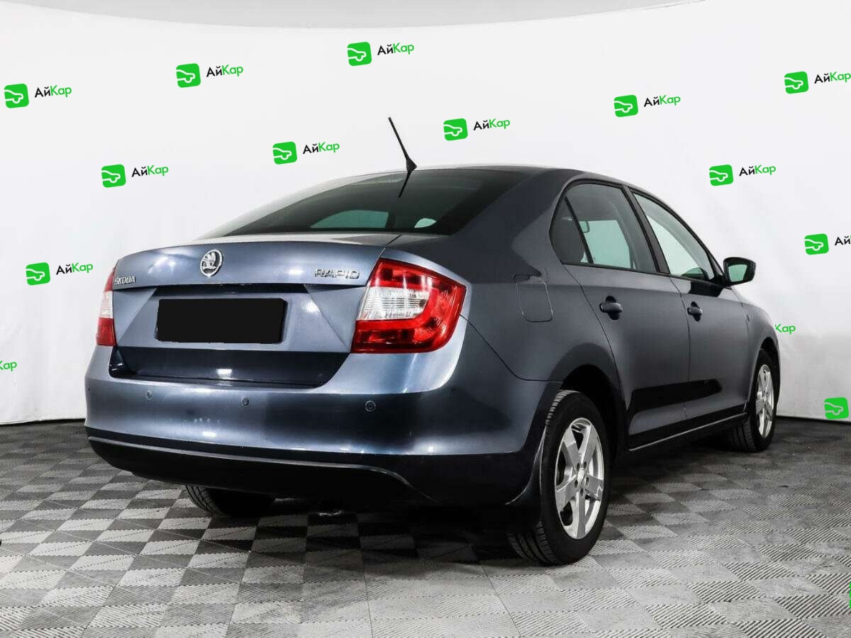 Skoda Rapid с пробегом — 2014 год. Фото: #3