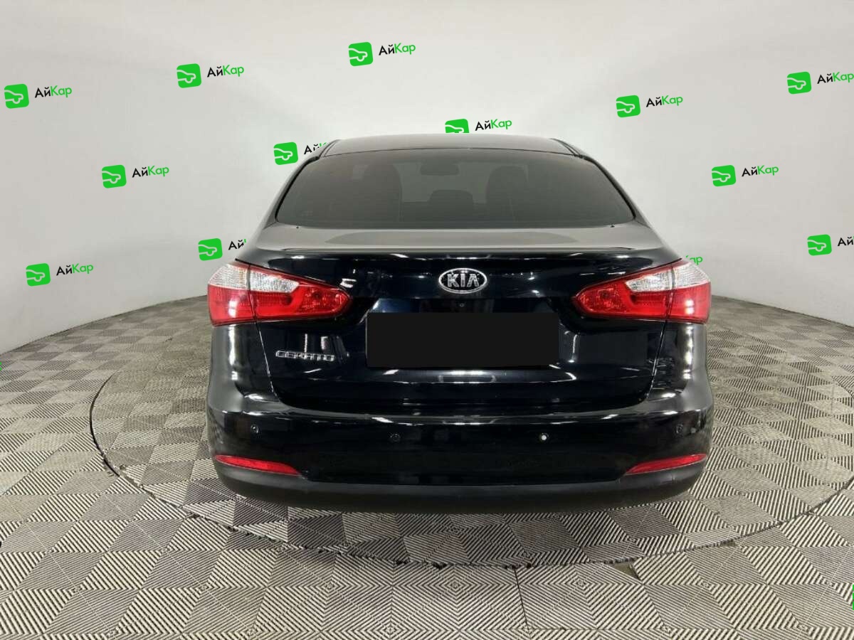 Kia Cerato с пробегом — 2014 год. Фото: #2