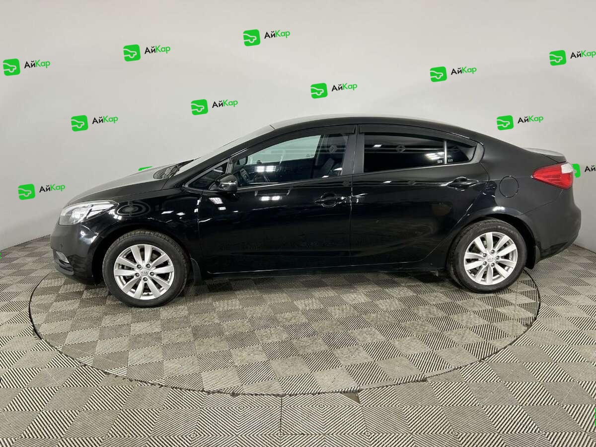 Kia Cerato с пробегом — 2014 год. Фото: #4