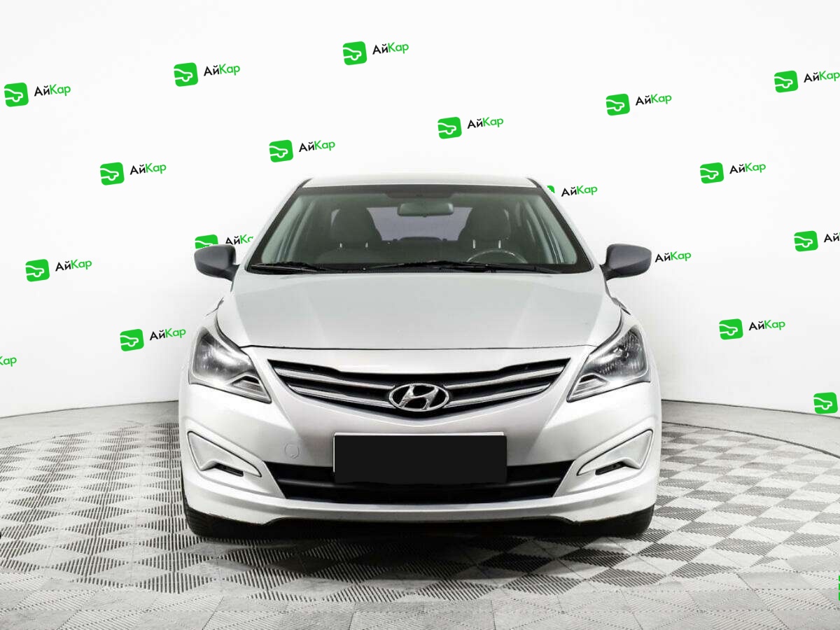 Hyundai Solaris с пробегом — 2014 год. Фото: #1