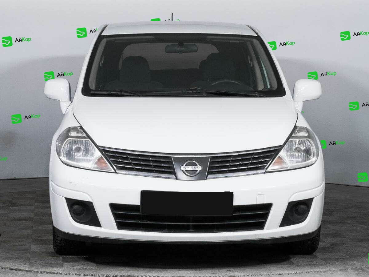 Nissan Tiida с пробегом — 2013 год. Фото: #1