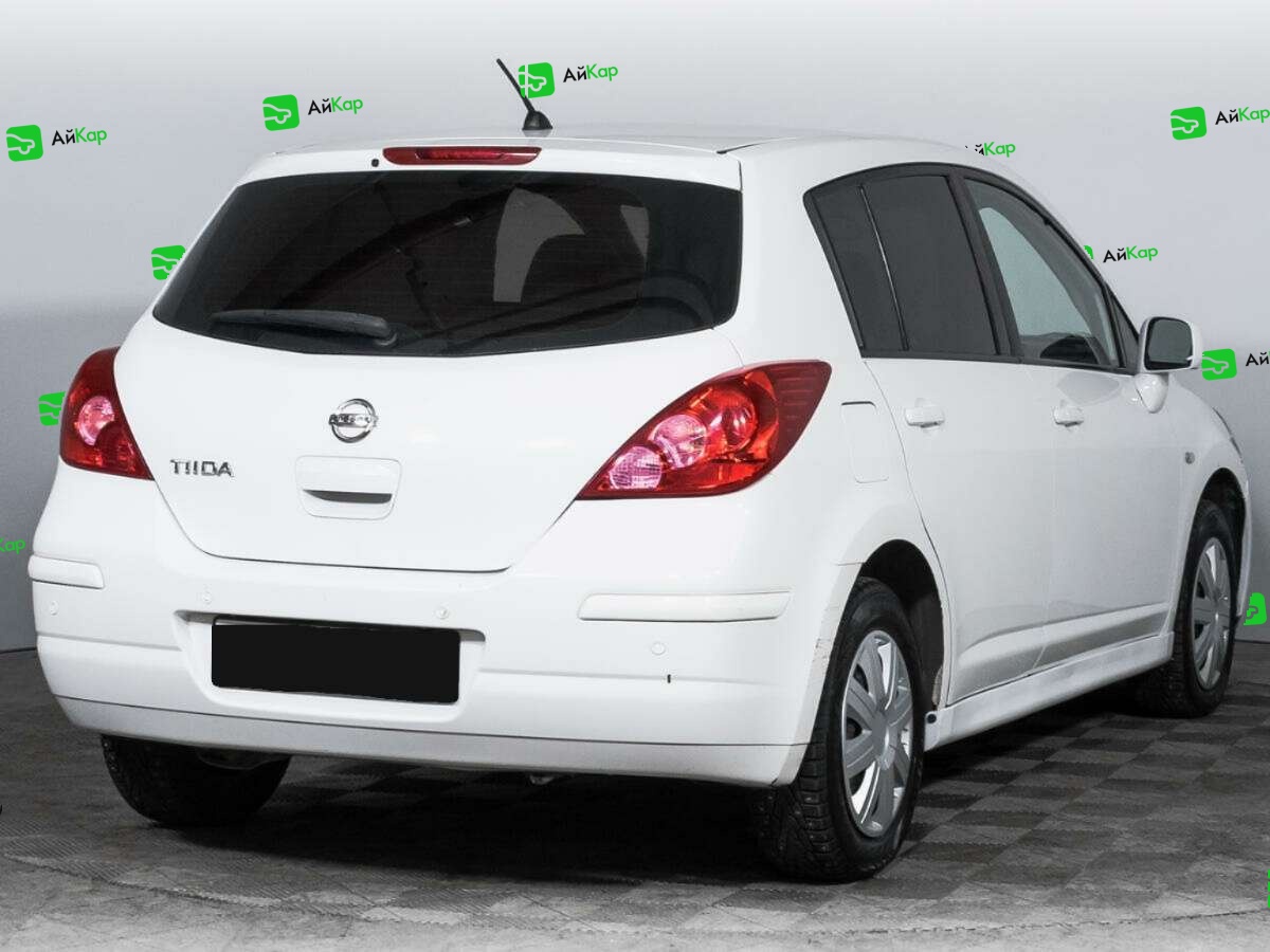 Nissan Tiida с пробегом — 2013 год. Фото: #4