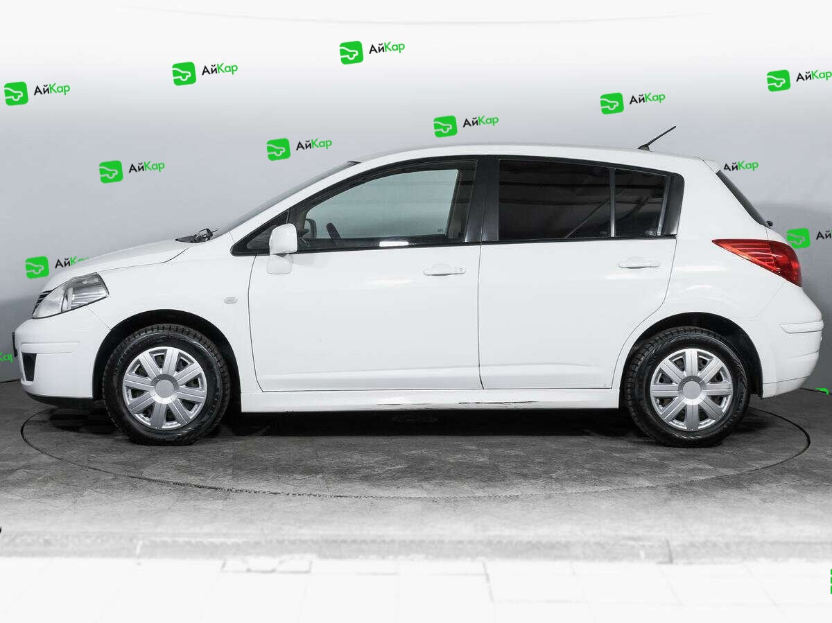 Nissan Tiida с пробегом — 2013 год. Фото: #6