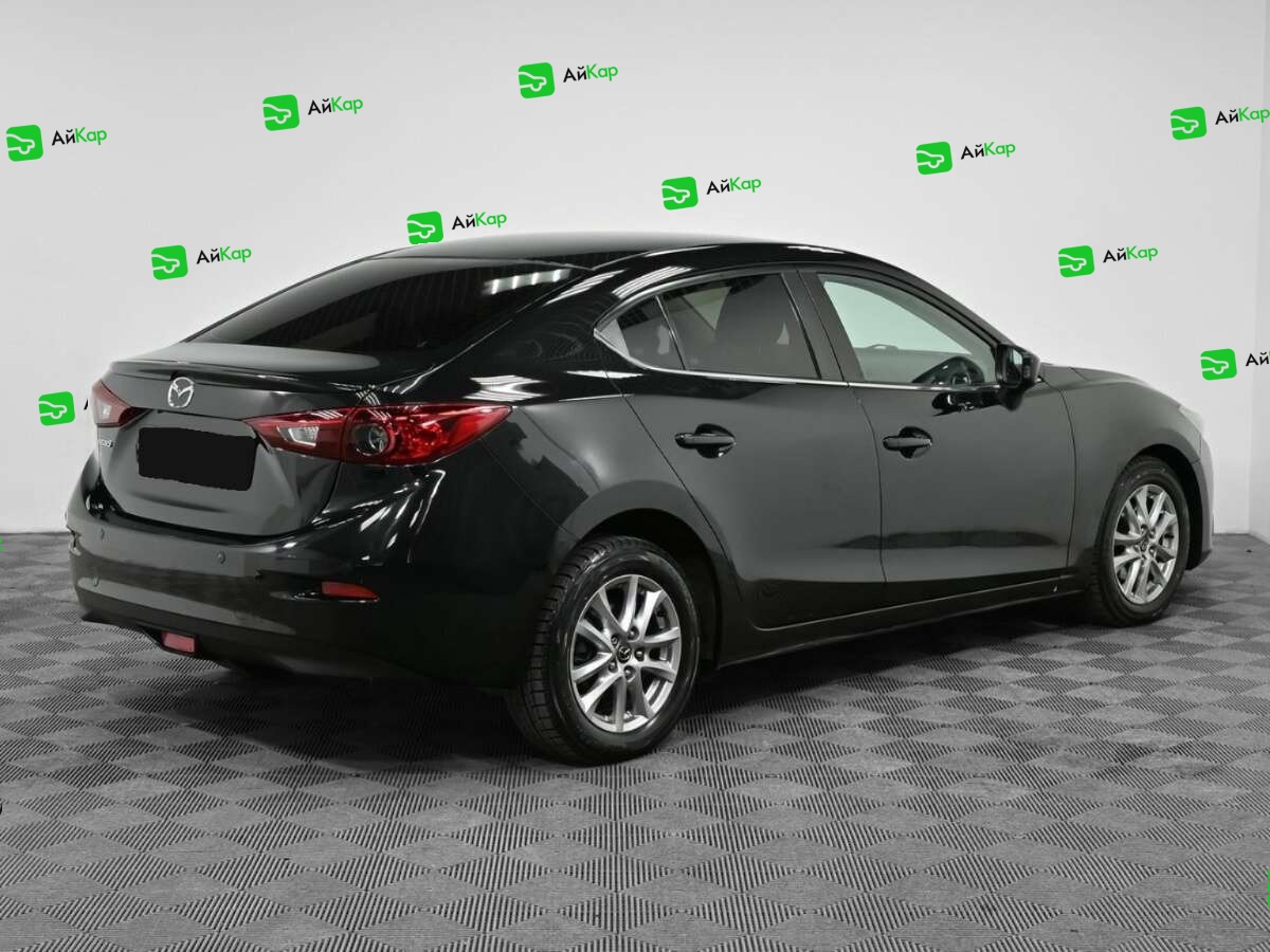 Mazda 3 с пробегом — 2013 год. Фото: #1