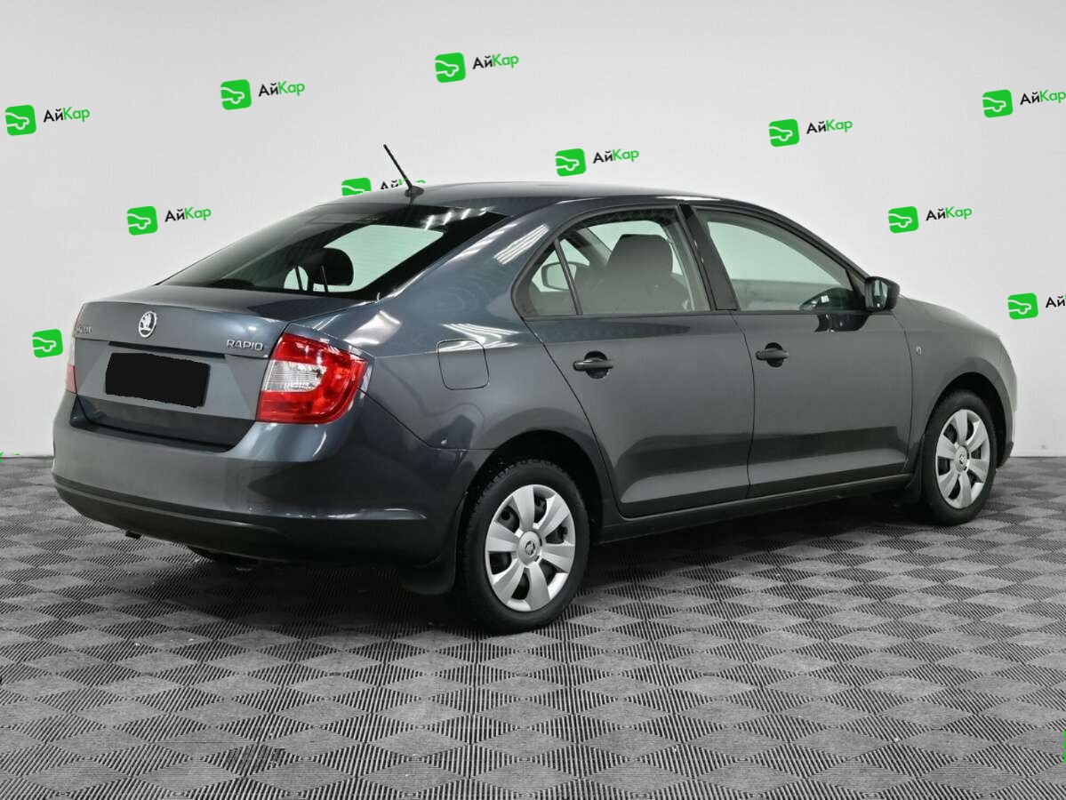 Skoda Rapid с пробегом — 2016 год. Фото: #1