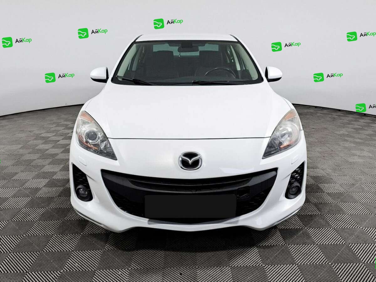 Mazda 3 с пробегом — 2013 год. Фото: #1